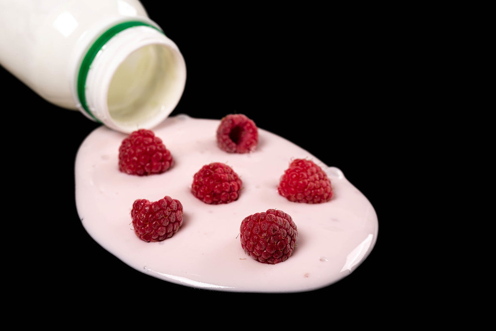 Close-up of spilled raspberry yogurt