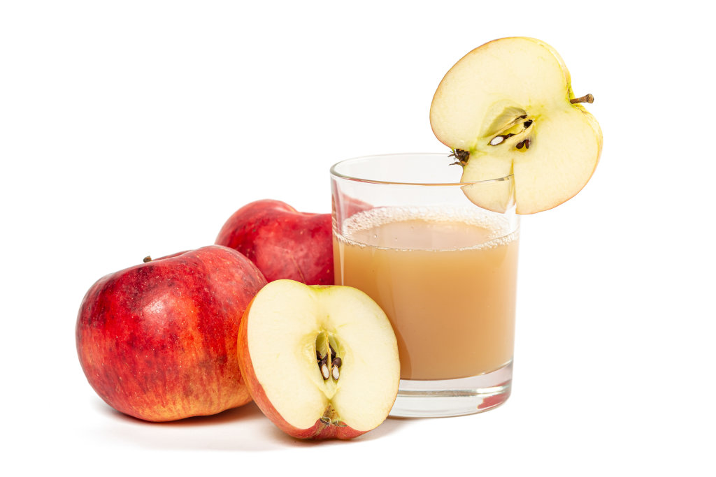 Fresh natural glass of juice with ripe apples