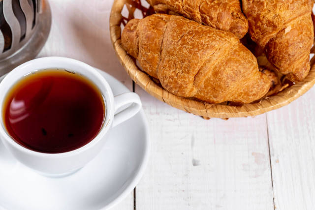 Cup of tea and croissants