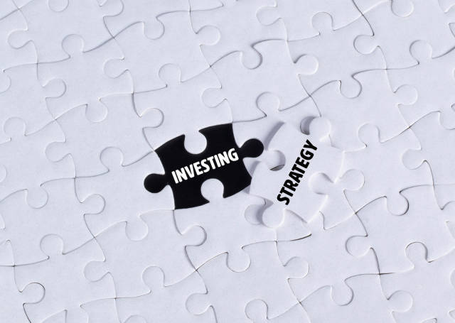 Missing puzzle piece with Investing Strategy text