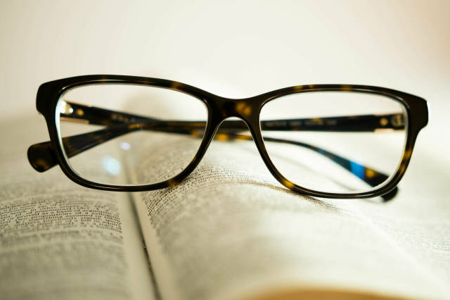 Reading glasses over a book