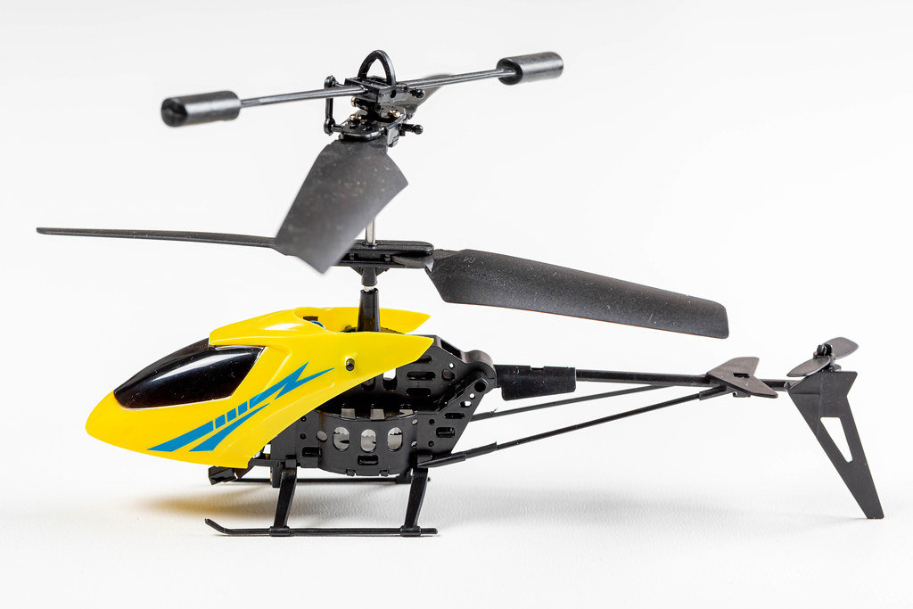 Model toy helicopter on a white background