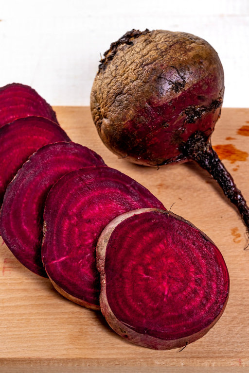Fresh raw beets on the kitchen Board