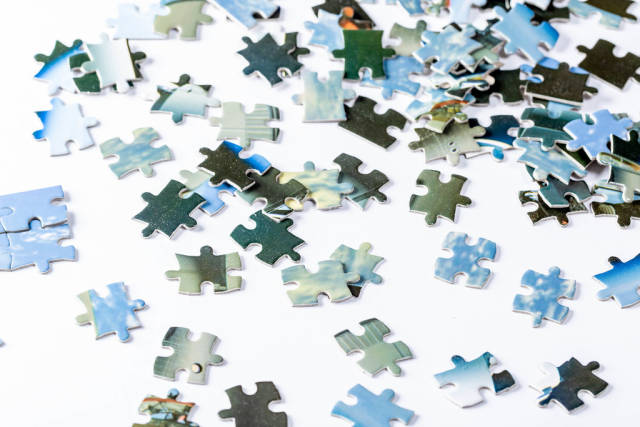 Pieces of a puzzle on white background
