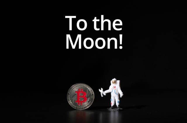 Astronaut with Silver Bitcoin and To the Moon text