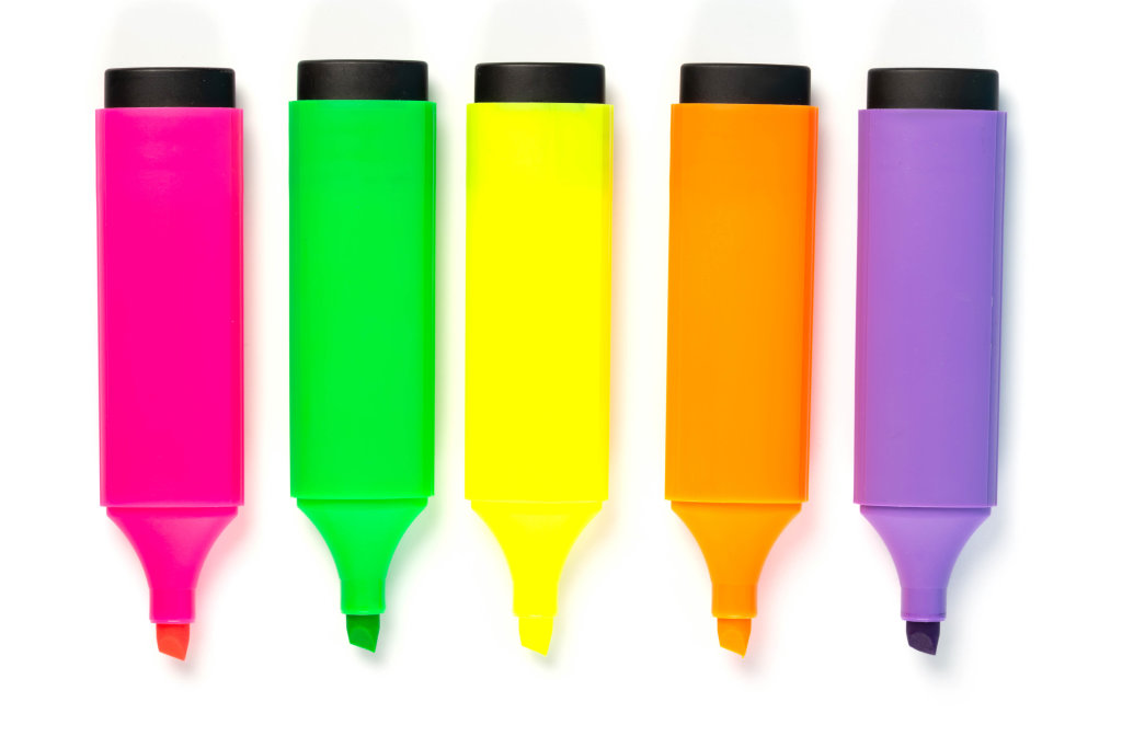 Open colored markers on white background