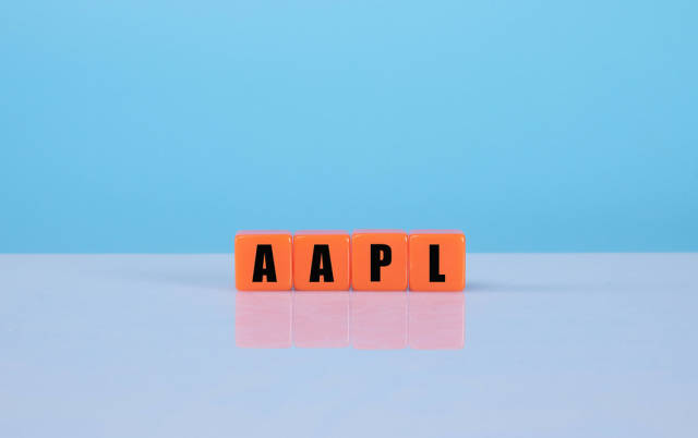 AAPL text on orange cubes