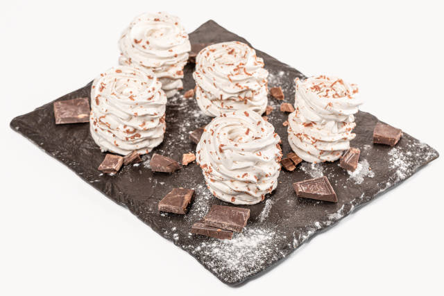 White marshmallow with grated and pieces of chocolate, homemade sweets