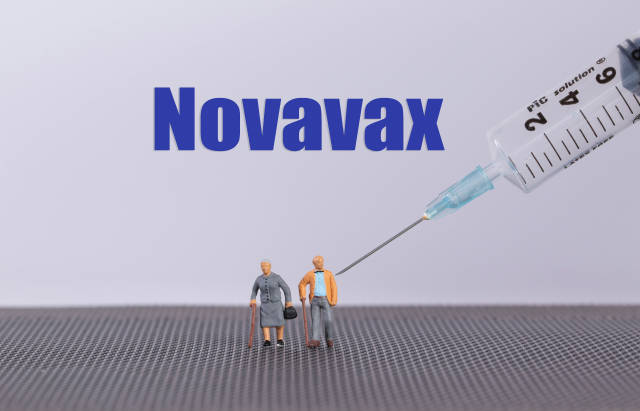 Older couple with syringe and Novavax text