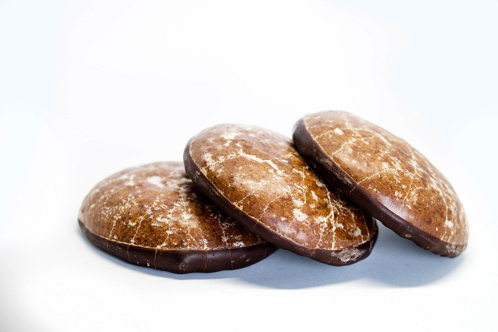 Chocolate ginger cookies on white background