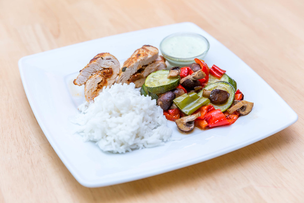 Turkey Hen Roulade with Rice and backed vegetables