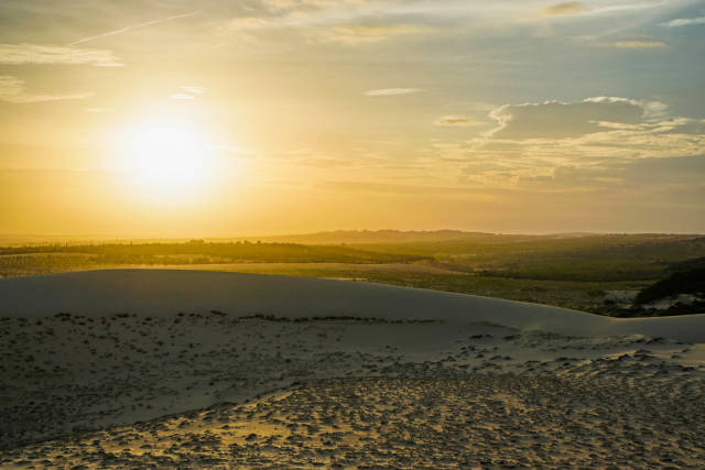 Sunset Watching from the White Sand Dunes in Mui Ne, Vietnam
