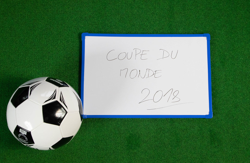 Soccer ball with Coupe du monde written on board