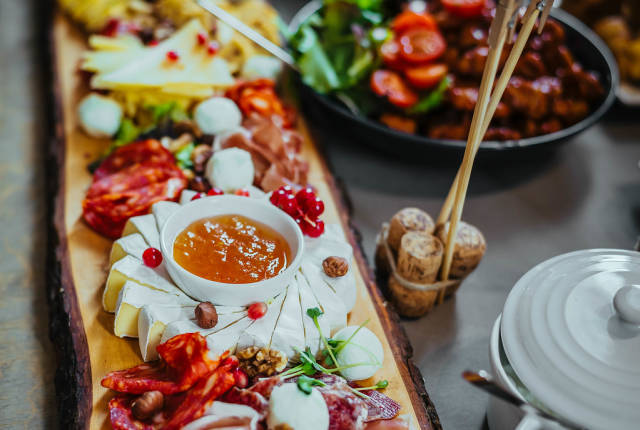 Plate Of Cheese And Snacks