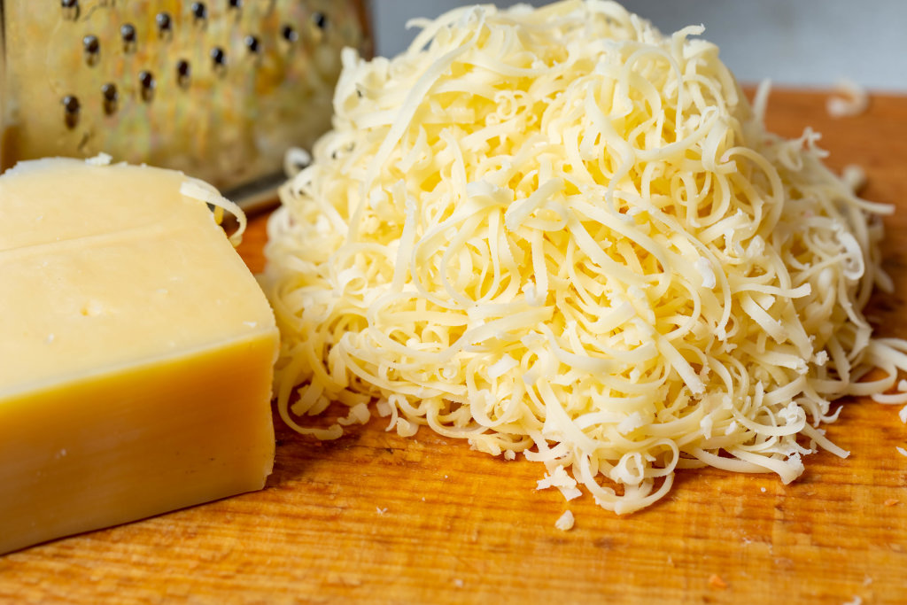 Grated cheese and grater