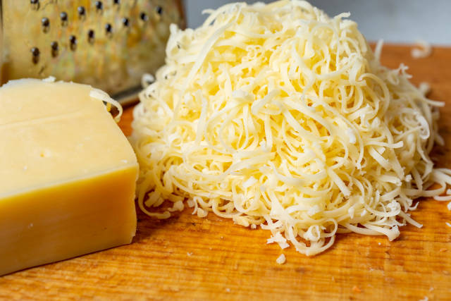 Grated cheese and grater