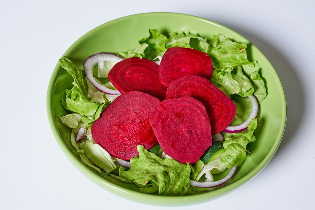 Healthy salad with beets and mixed greens