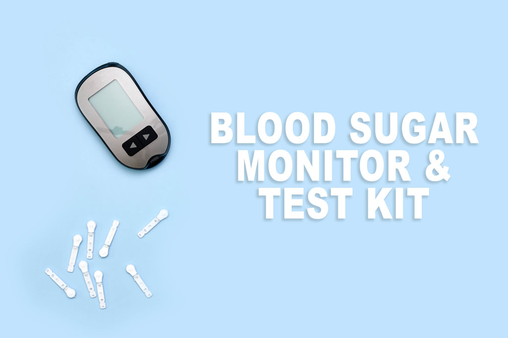 Blood sugar monitor and test kit on blue background