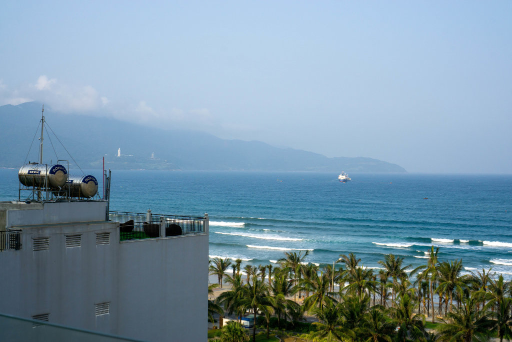 View of Linh Ung Pagoda on Son Tra Peninsula, My Khe Beach and the East Vietnam Sea from a Hotel in Da Nang, Vietnam