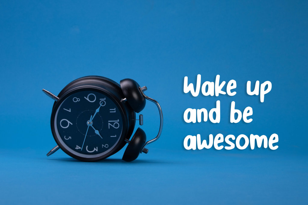 Alarm clock with Wake up and be awesome text on blue background