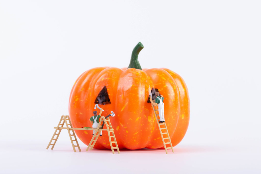 Miniature painters with Halloween pumpkin