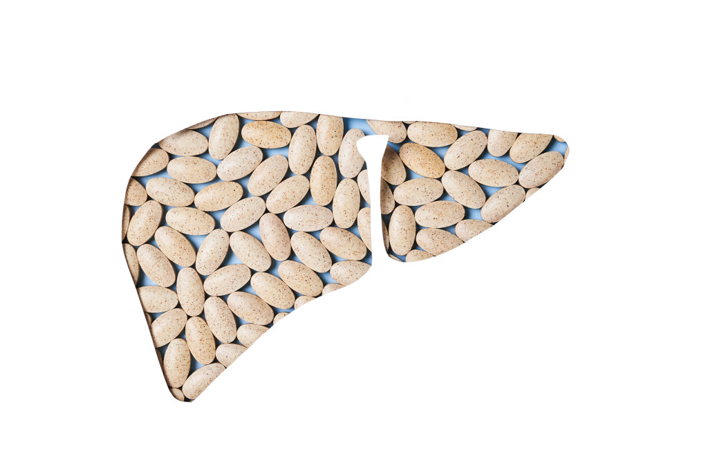 Pills in shape of liver. Liver recovery concept