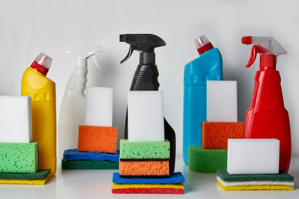 3. Various cleaning supplies, bottles and sponges. Cleaning concept