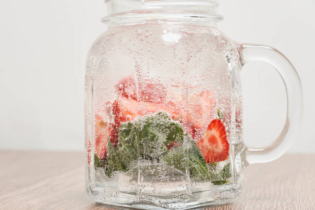 Glass of strawberry soda drink