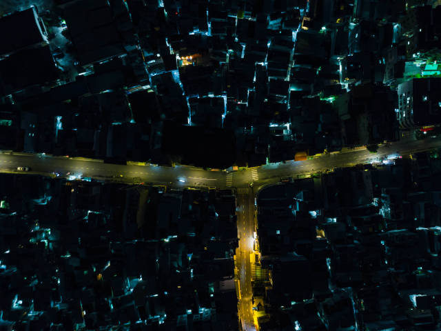 Top View Drone Photo of Bui Vien Walking Street with many Lights in several Alleys in District 1 in Ho Chi Minh City, Vietnam