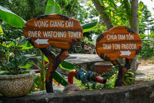 Wooden Signboards showing the Directions to the River Watching Tower and Tam Ton Pagoda at Marble Mountains in Da Nang, Vietnam