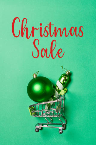 Christmas sale - xmas decorations in shopping trolley