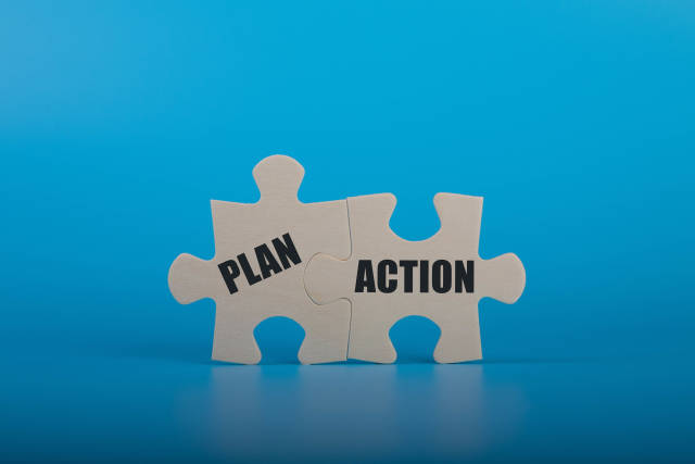 Puzzle pieces with Plan and Action text