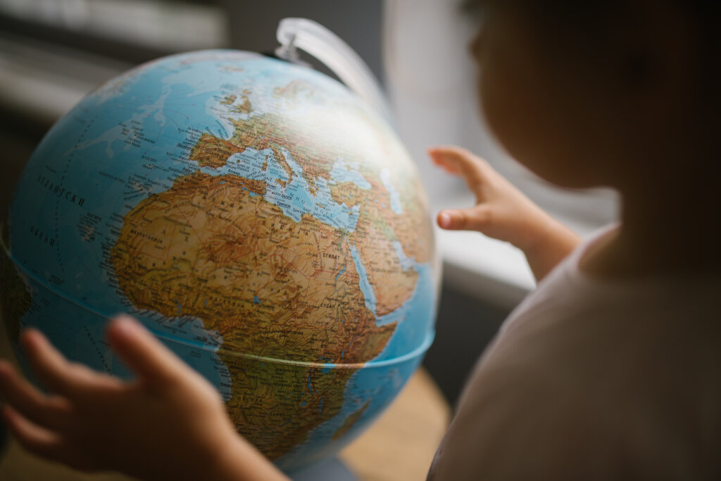 Girl looking at the global map.