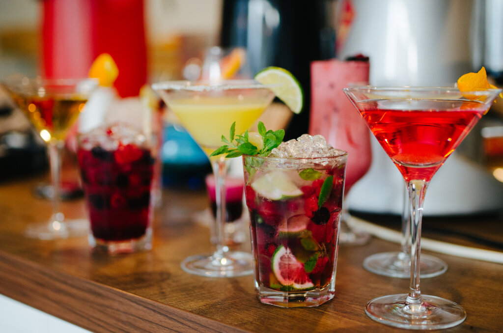 Various cocktails on the counter.
