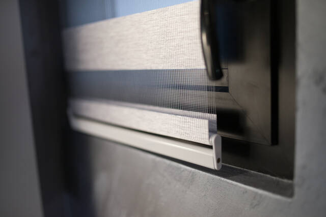 Closeup of the strip curtains mechanism.