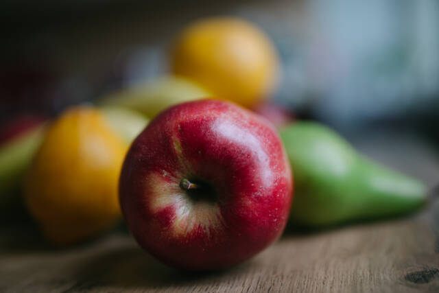 Fresh red apple closeup.