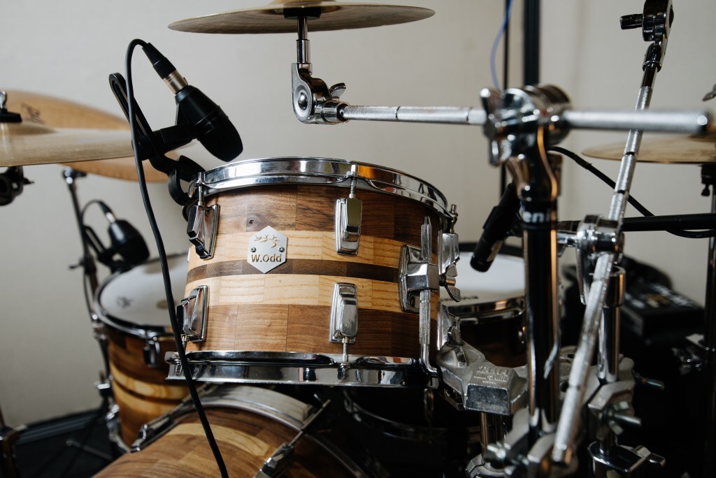A beautifully crafted wooden drum set