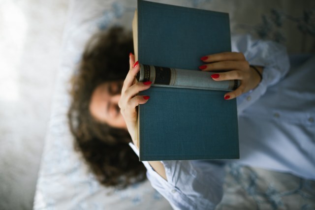 A young woman with curly hair